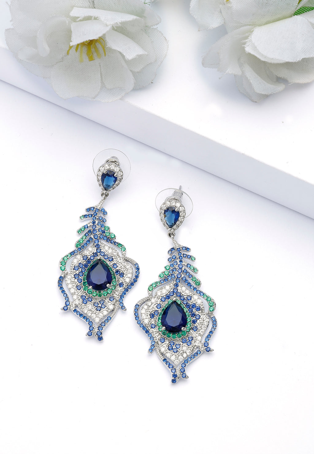 Pendientes de plumas de pavo real azul oscuro